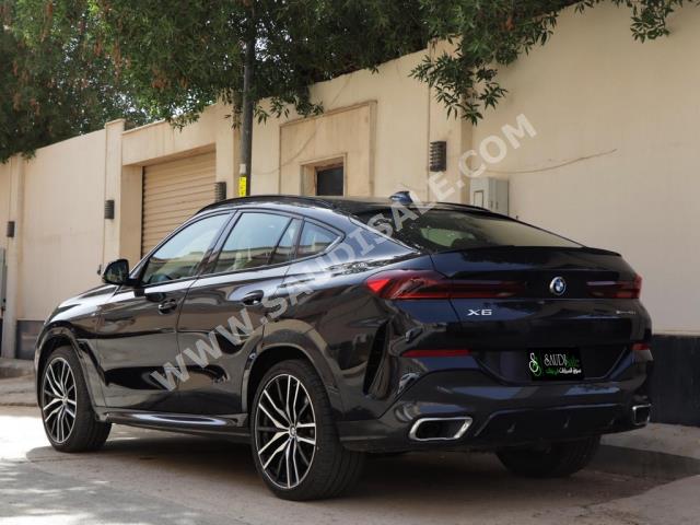 2021 بي ام دبليو الفئة اكس 6 إم كت
