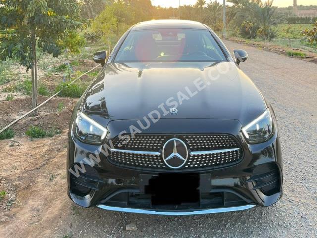 2021 مرسيدس - بنز إي 200 كوبيه أي إم دي