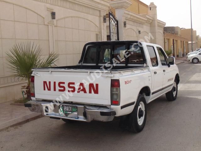 2002 نيسان داتسون غمارتين