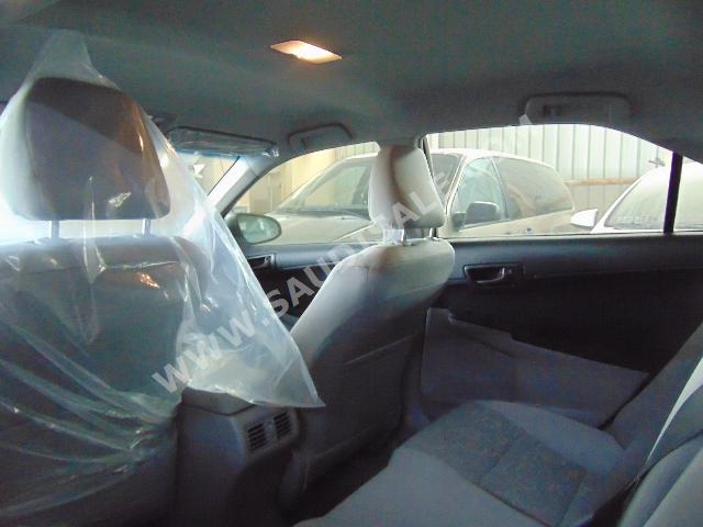 2015 تويوتا كامري جي ال