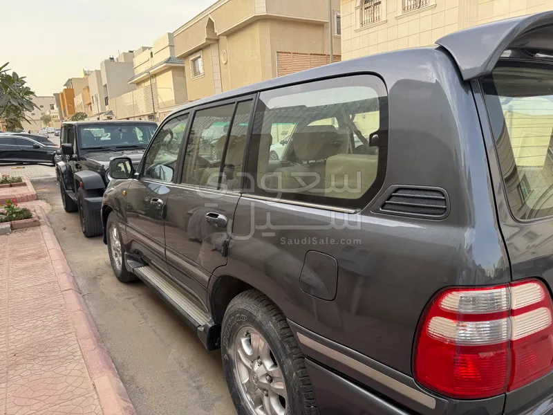 2003 تويوتا لاند كروزر جي اكس ار